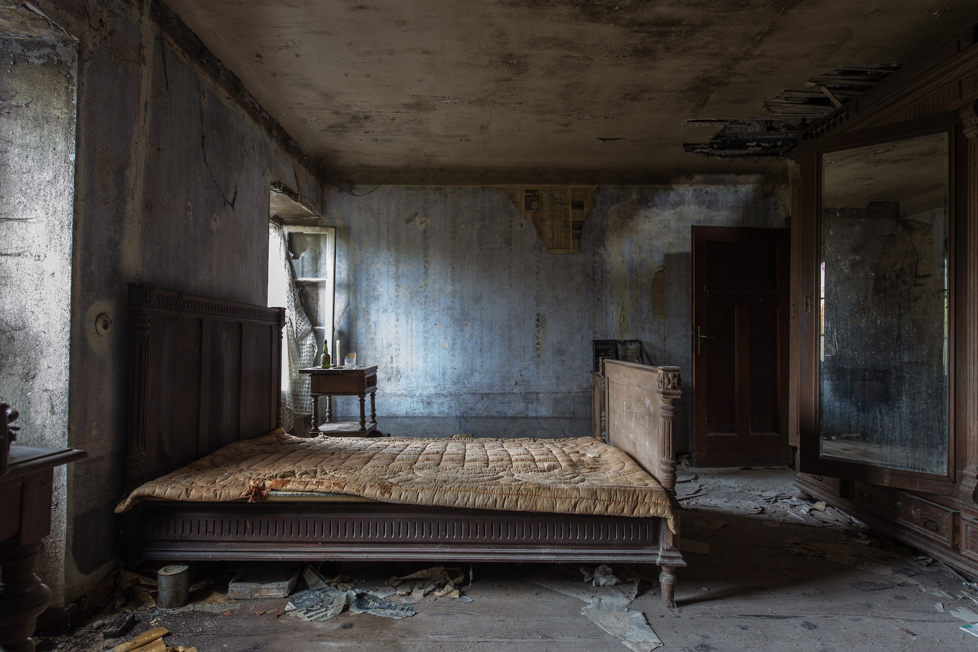 Photo by Wendelin Jacober: https://www.pexels.com/photo/empty-damaged-room-with-mattress-1853951/