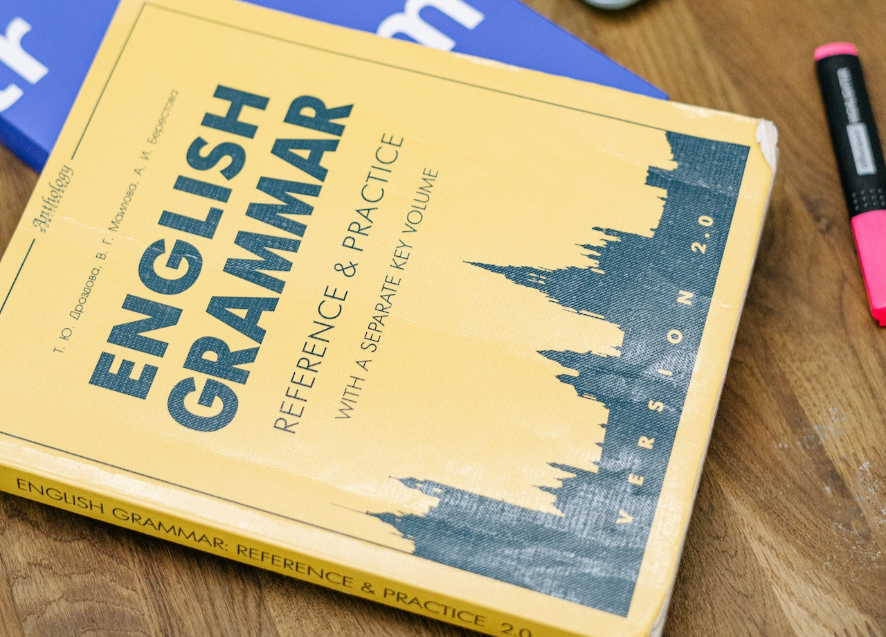 Photo by Ivan Samkov: https://www.pexels.com/photo/laptop-and-books-on-brown-wooden-table-5676740/